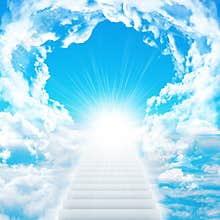 Stairs in sky with clouds and sun