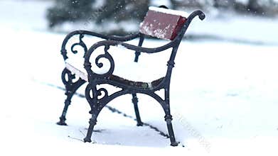 Details of actual snow falling at daytime in European city complicated life