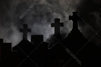 Headstone cross in Graveyard.