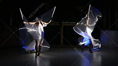 Actress girl in white LED wings