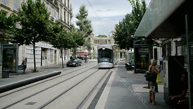 Modern tramway leaving station in Marseille, France