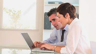 Businesspeople with a notebook