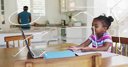 Home kitchen mother washing dishes while child picking pink crayon and coloring before laptop focus