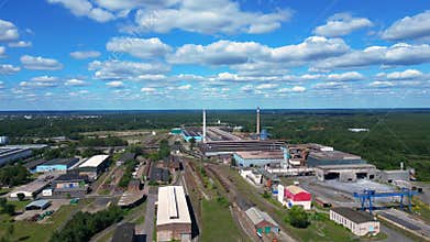 Big electric steel factory with chimneys. Lovely aerial view flight drone