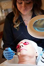 Woman Having Dermo Abrasion Cosmetic Treatment At Spa