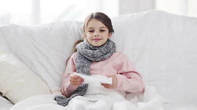 Ill girl with paper tissue