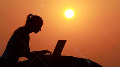 Girl working with laptop
