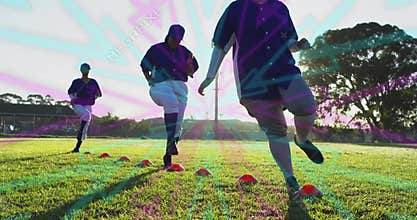 Practicing agility drills three female baseball players wearing uniforms on turf with orange cones