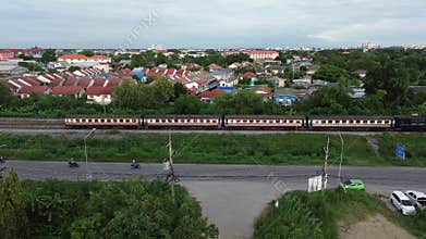 Aerial view the train leaves the Ayutthaya station .