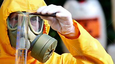 Chemist with a gas mask