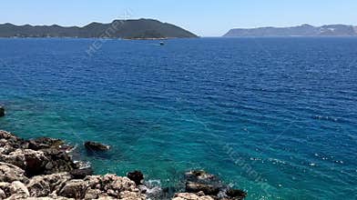 The waves of the Mediterranean Sea in Turkey, summer sunny day