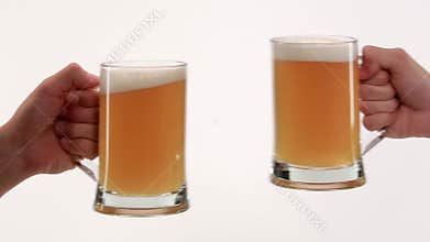 Clink glasses with beer