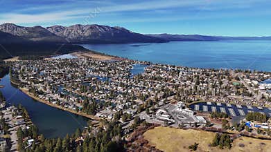 Aerial view of Lake Valley and Meyers with pine forest and highway leading to Lake Tahoe