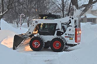 Bobcat doing snow removal