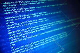 Screens with program web code and mouse