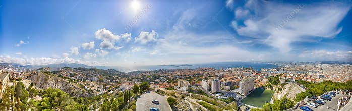 Panoramic view of the Vieux port of Marseille and Notre Dame de la Garde at back, France