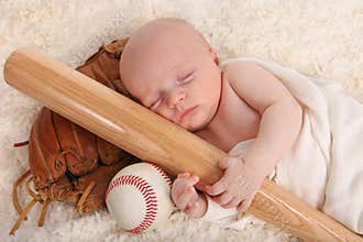 Little Baby Boy Holding a Baseball Bat