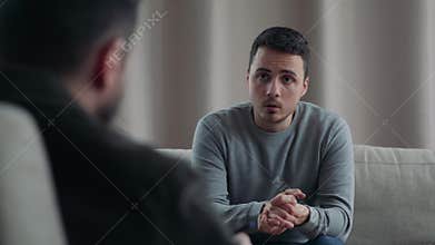 Young man on reception at the psychotherapist
