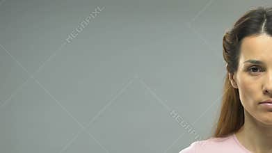 Girl wearing boxing glove half face, fight for women rights, self defense course