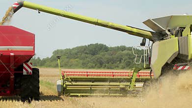 Harvesting On The Wheat Field Combine And Tractor Agriculture Machinery Technology Food Modification Crop Farming