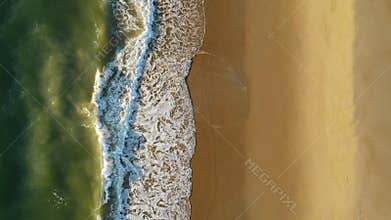 Emerald Ocean Waves Push Up onto the Sand at Virginia Beach USA