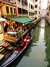 An Evening Out at Restaurant on Venice Canal, Italy