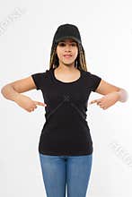 Afro woman in black template t shirt and baseball cap isolated on white background. Blank Sport hat and tshirt. African american