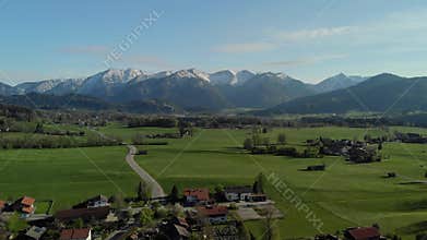 Flight over Bavarian village close to the alps