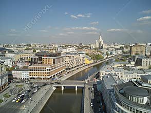 Moscow, Russia. Vodootvodnoy channel near Kremlin moving cars and pedestrians. Aerial view