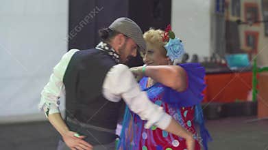 Spain - Flamenco.Couple man and woman in traditional dresses dancing flamenko.