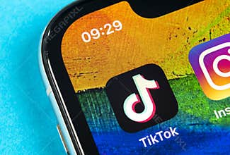 Tik Tok application icon on Apple iPhone X screen close-up. Tik Tok icon. tik tok application. Tiktok Social media network. Social