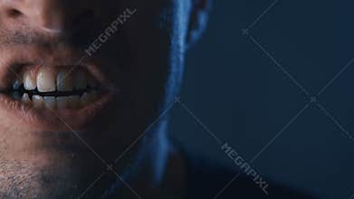 Close-up mouth of Aggressive Man screaming. Danger Violence. Angry man Shouting with Mouth wide open.