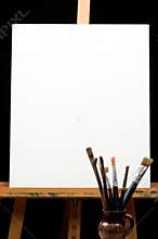 Canvas,brushes and easel