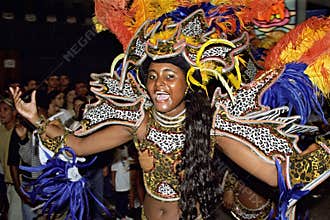 Brazilian female dancer during street carnival in Rio