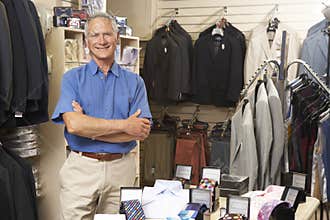 Male sales assistant in clothing store