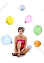 Cute young girl with colorful balloons