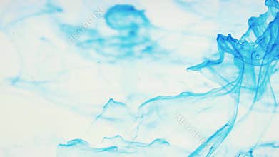 Blue ink colours in water.