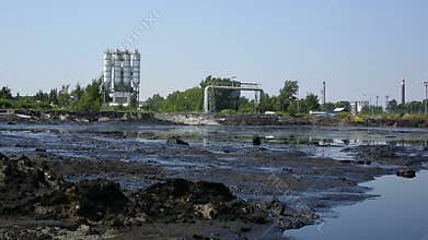 The former dump toxic waste, effects nature from contaminated soil and water with chemicals and oil, environmental