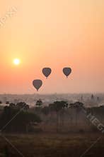 Hot air balloons in Bagan at sunrise