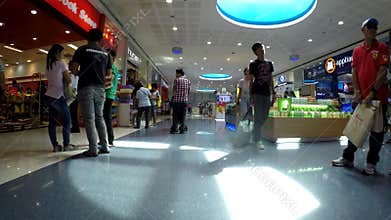 Modern indoor shopping mall stalls. tracking shot