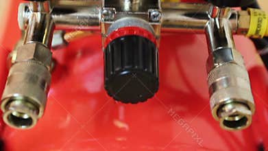 Manometer pressure gauges and tank drain valves of air compressor