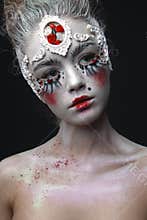 Young girl with a white hair and creative makeup