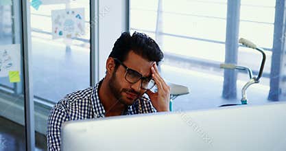 Frustrated executive working on desktop pc 4k