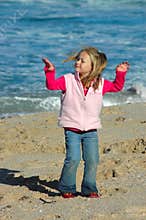Girl dancing on beach