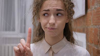 Waving Finger and Shaking Head to No, Young Female