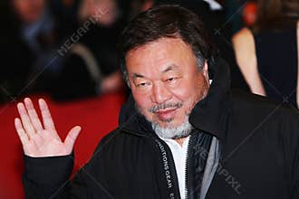 Ai Weiwei poses on the red carpet