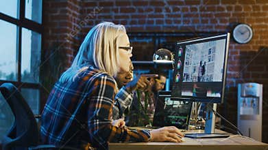 Colleagues working on video edit