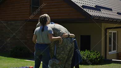 Military man returning home to family