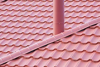 New red Tiled Roof with metal chimney house.