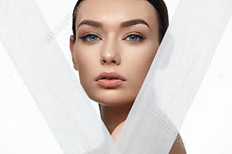 Face Skin Beauty. Beautiful Woman With Natural Makeup